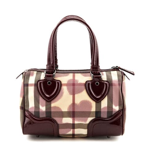 burberry heart print backpack|Burberry check and leather bag.